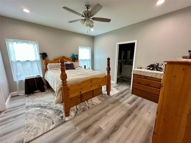 bedroom featuring light wood-style floors, baseboards, a ceiling fan, and recessed lighting