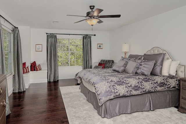 38 Southgate Dr, The Woodlands, TX 77380 - bedroom with wood finished floors, ceiling fan, and visible vents