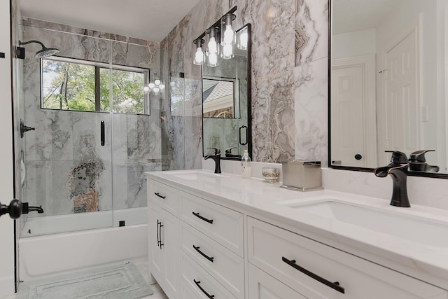 38 Southgate Dr, The Woodlands, TX 77380 - full bathroom featuring shower / bath combination with glass door, double vanity, and a sink