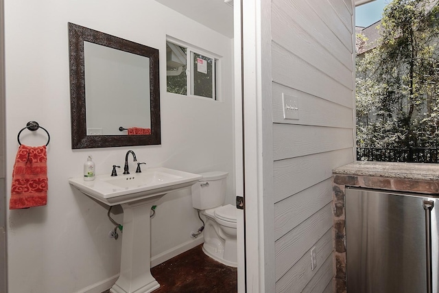 38 Southgate Dr, The Woodlands, TX 77380 - half bath featuring toilet and baseboards