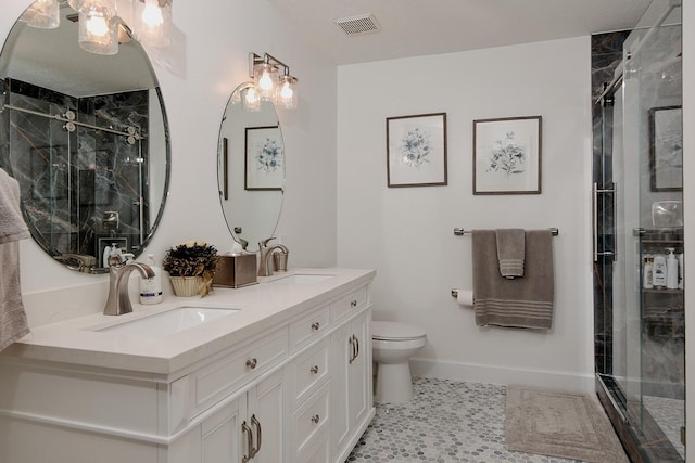 38 Southgate Dr, The Woodlands, TX 77380 - bathroom featuring a stall shower, a sink, and visible vents