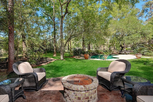 38 Southgate Dr, The Woodlands, TX 77380 - view of yard featuring a patio area, an outdoor pool, and an outdoor fire pit