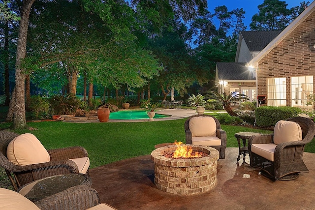 38 Southgate Dr, The Woodlands, TX 77380 - view of yard with an outdoor fire pit, a patio, and an outdoor pool