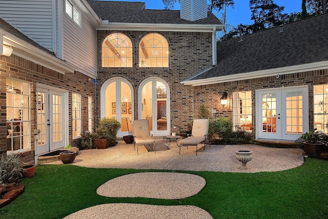 38 Southgate Dr, The Woodlands, TX 77380 - back of house with a chimney, a patio, french doors, and brick siding