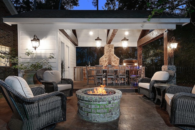 38 Southgate Dr, The Woodlands, TX 77380 - view of patio / terrace featuring an outdoor living space with a fire pit