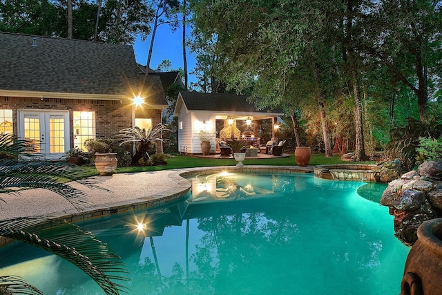 38 Southgate Dr, The Woodlands, TX 77380 - outdoor pool with a patio, french doors, and an outdoor structure
