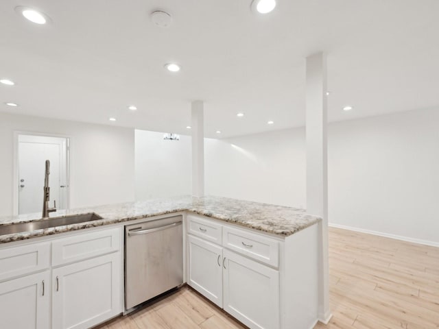 1812 Saxony Ln, Houston, TX 77058 - kitchen with dishwasher, a sink, white cabinetry, light stone counters, and recessed lighting