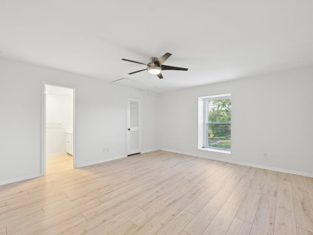 1812 Saxony Ln, Houston, TX 77058 - spare room with light wood-type flooring, ceiling fan, and baseboards