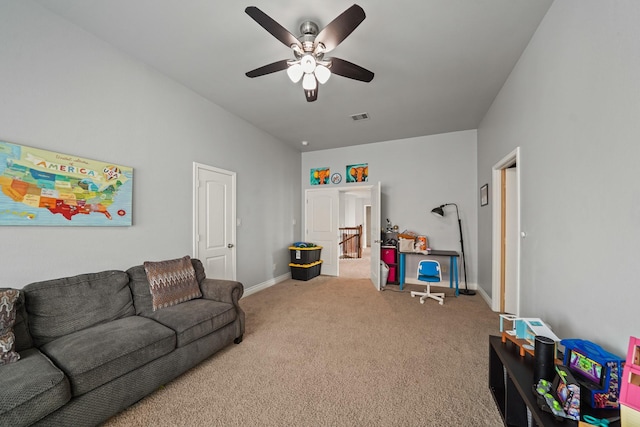 living room with visible vents, ceiling fan, carpet flooring, and baseboards