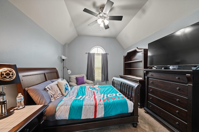 bedroom with lofted ceiling, ceiling fan, and carpet floors