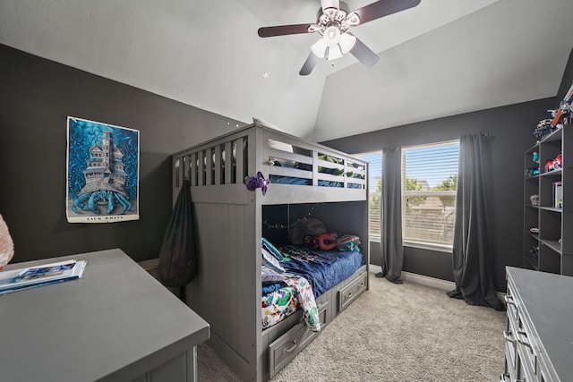 bedroom with baseboards, a ceiling fan, light colored carpet, and vaulted ceiling