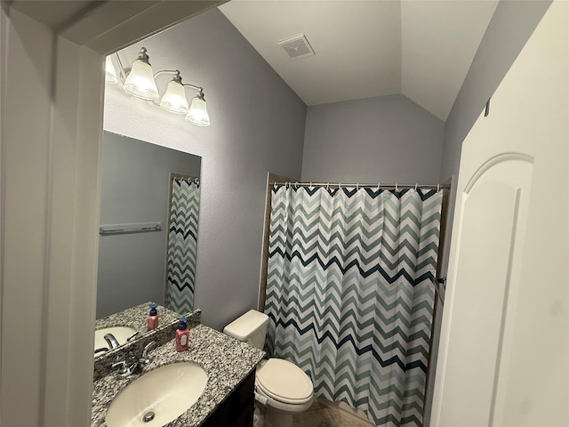 full bath featuring vanity, toilet, visible vents, vaulted ceiling, and a shower with shower curtain