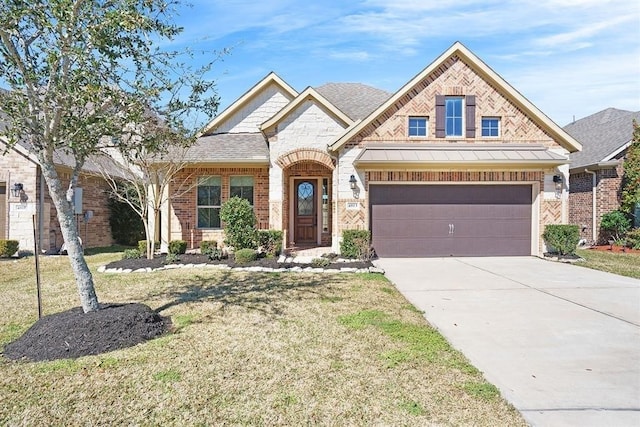 4813 Loures Ln, League City, TX 77573 - french country inspired facade with an attached garage, a front lawn, driveway, and brick siding