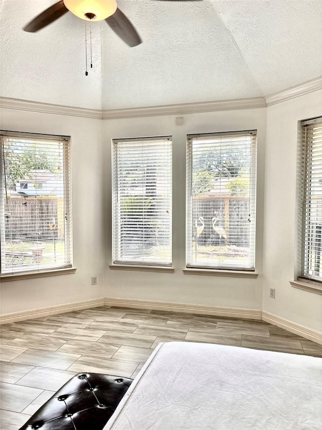 11423 Corola Trail Dr, Houston, TX 77066 - unfurnished room featuring plenty of natural light, a textured ceiling, crown molding, and a ceiling fan