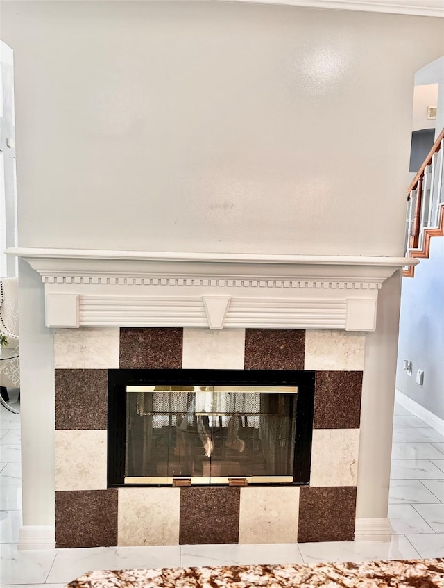 11423 Corola Trail Dr, Houston, TX 77066 - details featuring a tiled fireplace and baseboards