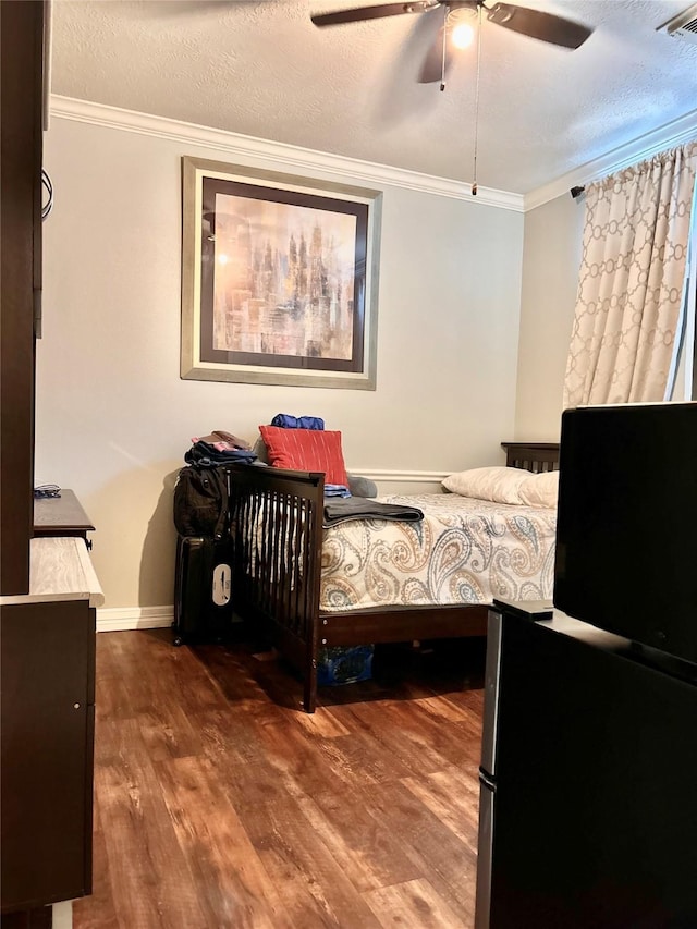 11423 Corola Trail Dr, Houston, TX 77066 - bedroom featuring visible vents, ornamental molding, a ceiling fan, and wood finished floors