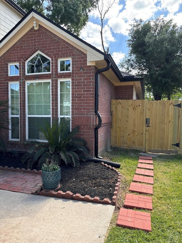 11423 Corola Trail Dr, Houston, TX 77066 - view of property exterior with brick siding and fence