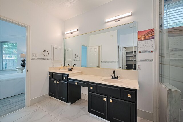 11423 Corola Trail Dr, Houston, TX 77066 - bathroom featuring double vanity, connected bathroom, and marble finish floors
