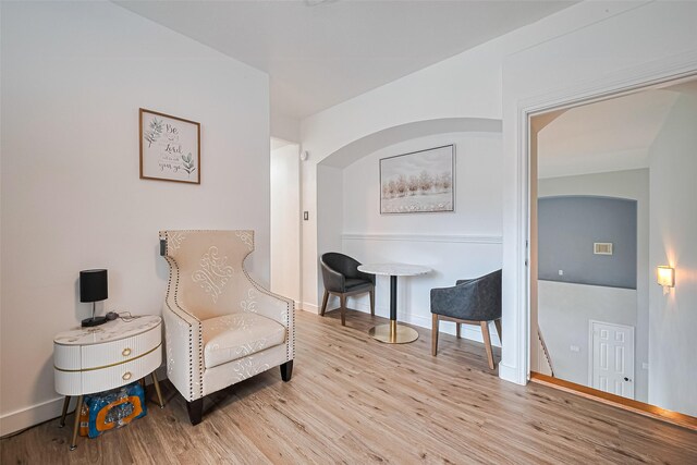 11423 Corola Trail Dr, Houston, TX 77066 - sitting room with wood finished floors and arched walkways