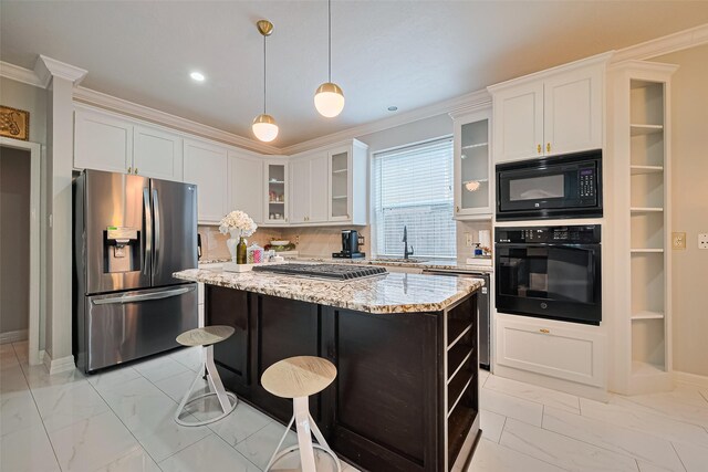 11423 Corola Trail Dr, Houston, TX 77066 - kitchen featuring black appliances, light marble finish flooring, crown molding, a center island, and light stone countertops