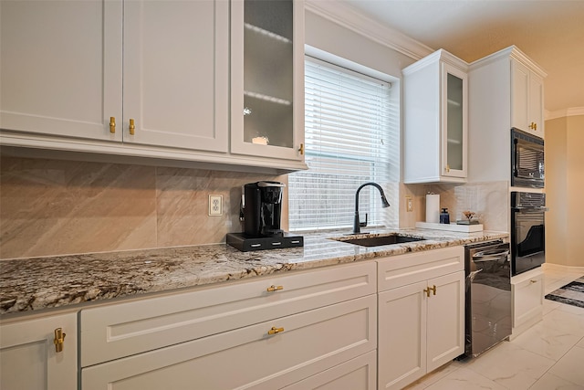 11423 Corola Trail Dr, Houston, TX 77066 - kitchen with black appliances, light stone countertops, white cabinets, light marble finish floors, and tasteful backsplash