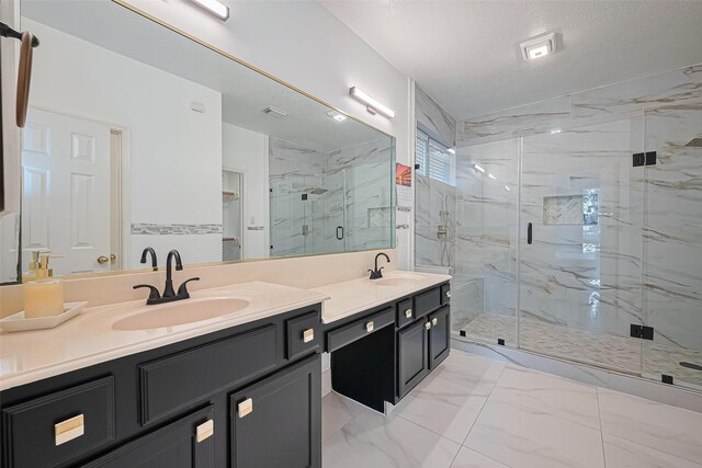 11423 Corola Trail Dr, Houston, TX 77066 - bathroom featuring marble finish flooring, a marble finish shower, and double vanity