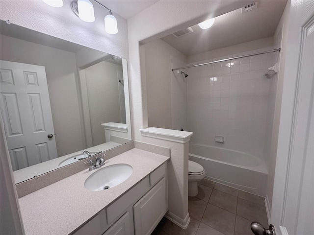 24410 Bludana Ln, Richmond, TX 77406 - bathroom with vanity, tile patterned floors, shower / tub combination, toilet, and visible vents