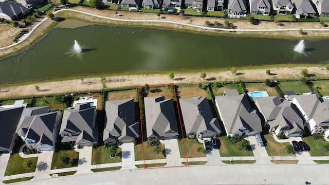 24410 Bludana Ln, Richmond, TX 77406 - drone / aerial view with a water view and a residential view