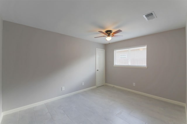 3605 Barberry Dr, Houston, TX 77051 - empty room featuring visible vents, baseboards, light tile patterned flooring, and ceiling fan