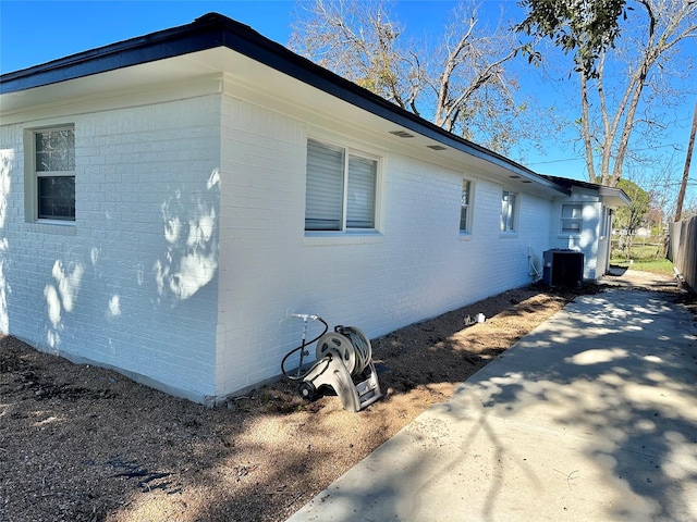 3605 Barberry Dr, Houston, TX 77051 - view of side of property with brick siding and central air condition unit