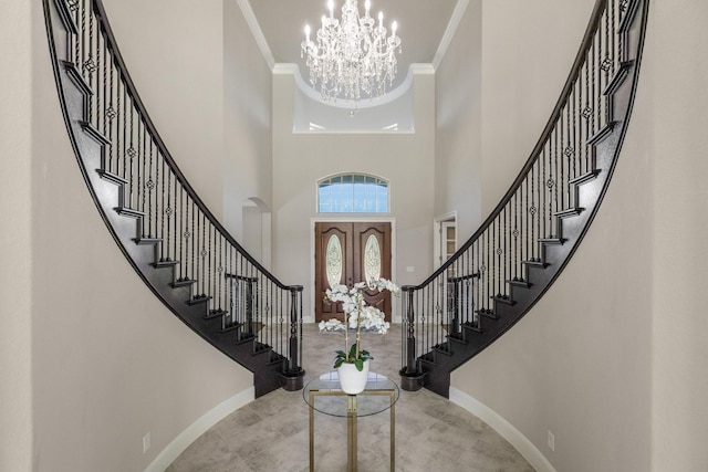 26406 Crimson Bluff Ln, Katy, TX 77494 - entryway with ornamental molding, baseboards, and a notable chandelier