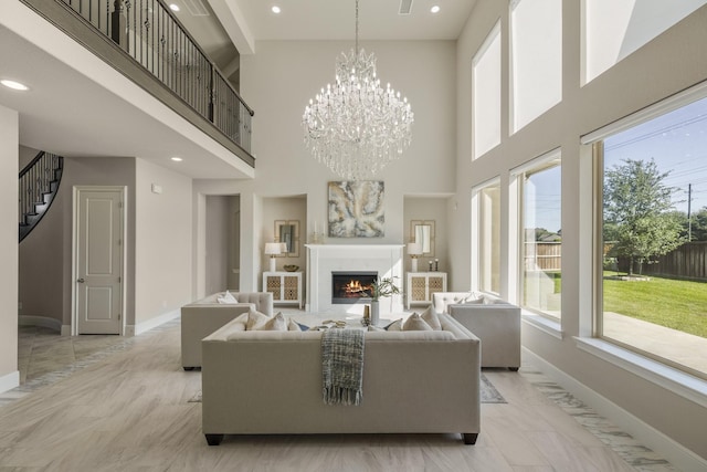 26406 Crimson Bluff Ln, Katy, TX 77494 - living room with a towering ceiling, baseboards, and a healthy amount of sunlight
