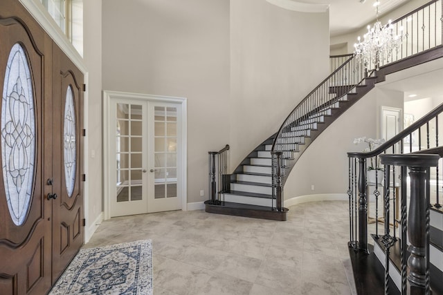 26406 Crimson Bluff Ln, Katy, TX 77494 - entryway featuring french doors, a towering ceiling, and stairs