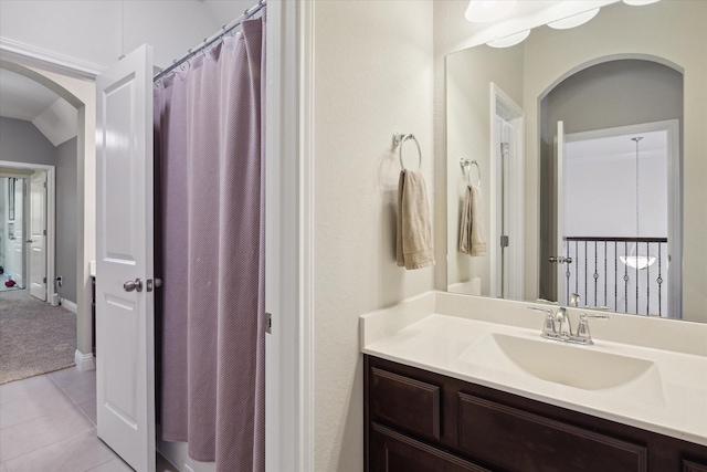 full bath with vanity and tile patterned floors