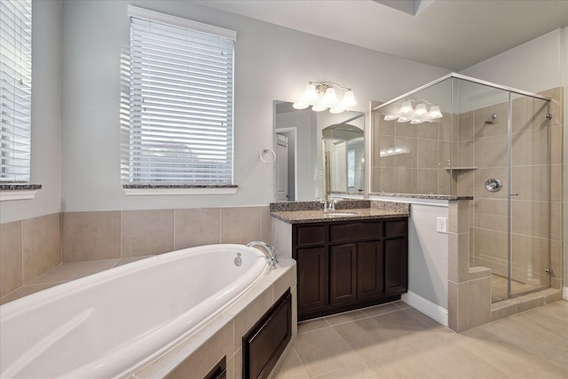 full bath with a bath, a shower stall, tile patterned flooring, and vanity