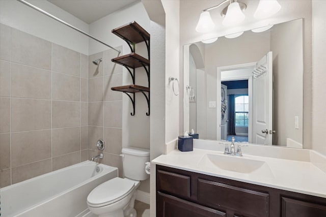 bathroom with shower / bathtub combination, baseboards, vanity, and toilet