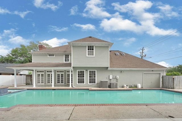 4618 Sao Paulo St, Pasadena, TX 77504 - view of pool with french doors, central air condition unit, and a patio area