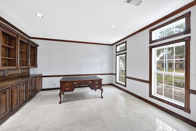 game room featuring ornamental molding, baseboards, a wealth of natural light, and visible vents