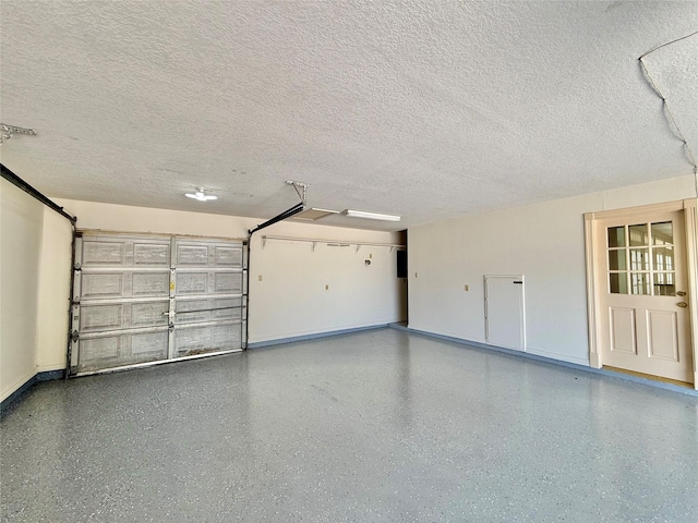 garage featuring baseboards