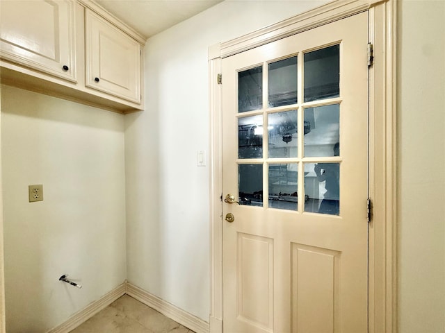 interior space featuring baseboards