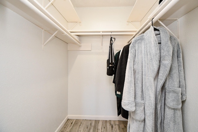 10555 Turtlewood Ct Unit 2606, Houston, TX 77072 - spacious closet featuring wood finished floors
