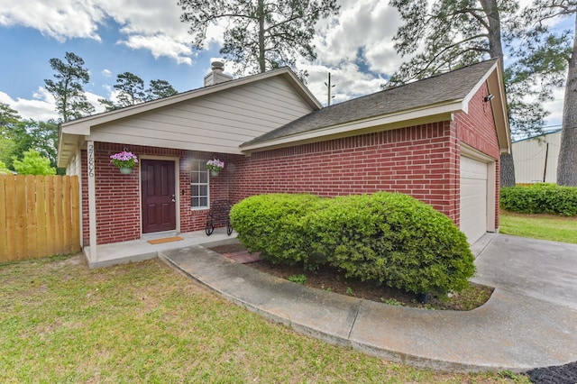 27806 Red Fox Rd, Tomball, TX 77377 - ranch-style home with driveway, a front yard, brick siding, a garage, and fence
