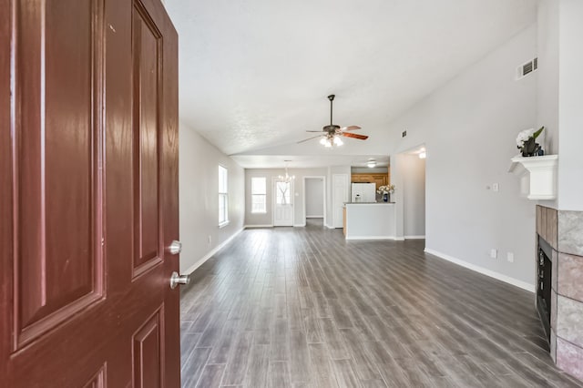 27806 Red Fox Rd, Tomball, TX 77377 - unfurnished living room featuring visible vents, baseboards, ceiling fan, a fireplace, and wood finished floors