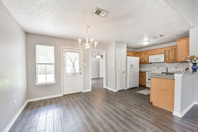27806 Red Fox Rd, Tomball, TX 77377 - kitchen with a sink, visible vents, white appliances, and a notable chandelier