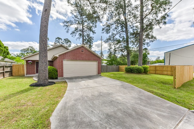 27806 Red Fox Rd, Tomball, TX 77377 - exterior space with concrete driveway, brick siding, an attached garage, and a front lawn