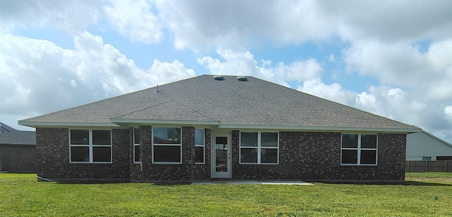 9 Gemstone Ct, Angleton, TX 77515 - back of property featuring brick siding and a shingled roof