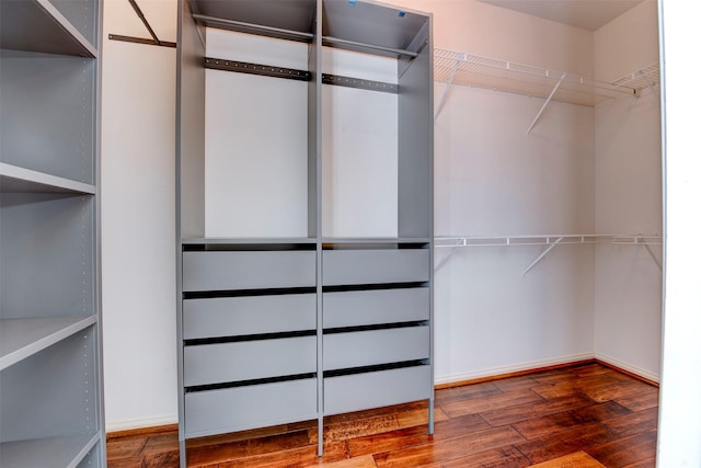 2111 Welch St Unit A107, Houston, TX 77019 - spacious closet featuring wood finished floors