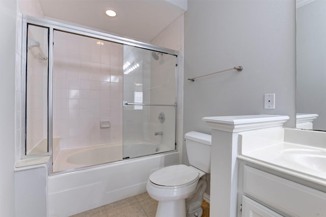 2111 Welch St Unit A107, Houston, TX 77019 - bathroom featuring toilet, tile patterned flooring, combined bath / shower with glass door, vanity, and recessed lighting