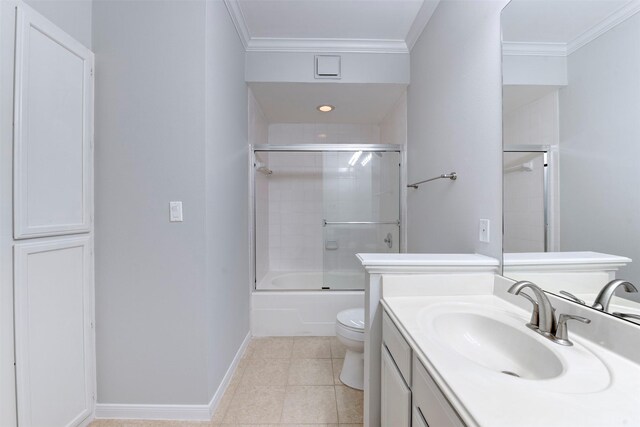 2111 Welch St Unit A107, Houston, TX 77019 - bathroom featuring crown molding, toilet, baseboards, vanity, and combined bath / shower with glass door