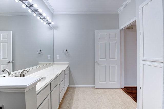 2111 Welch St Unit A107, Houston, TX 77019 - bathroom featuring ornamental molding, vanity, tile patterned floors, and baseboards